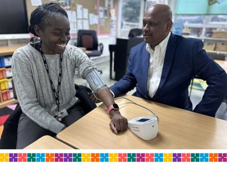 Young woman has her blood pressure checked